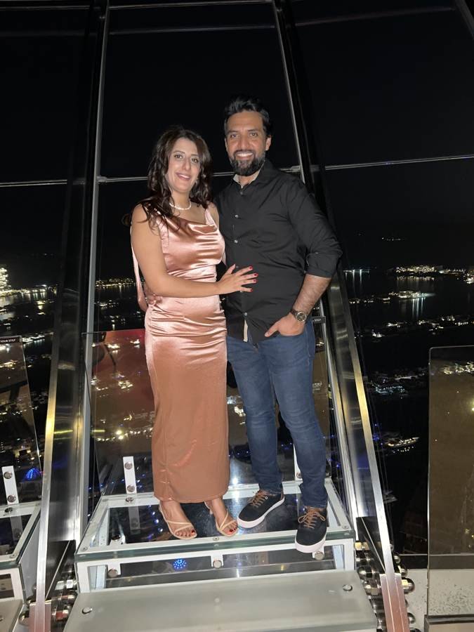 standing on glass, high above the lights